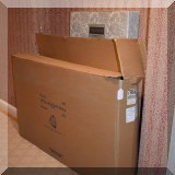 F65. Maple Morigeau Furniture crib in original box. 